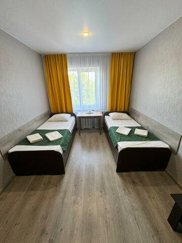 2-местный номер эконом с 2 односпальными кроватями в Гостинице Каштан