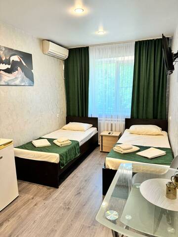 2-местный номер стандарт с 2 односпальными кроватями в Гостинице Каштан